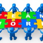 3d people holding pieces of a jigsaw puzzle with the word teamwork.